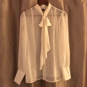 Sheer white tie neck blouse